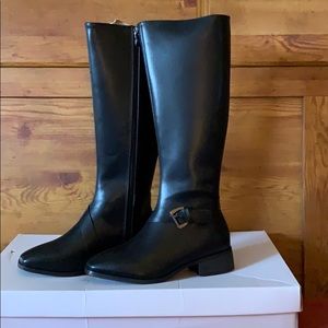 Below knee high black boots